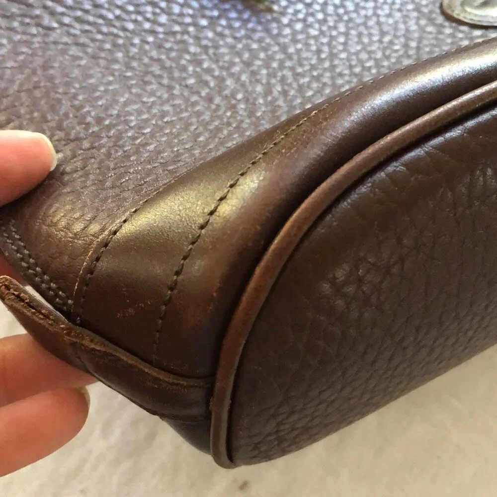 Dooney & Bourke brown pebbled leather handbag green interior